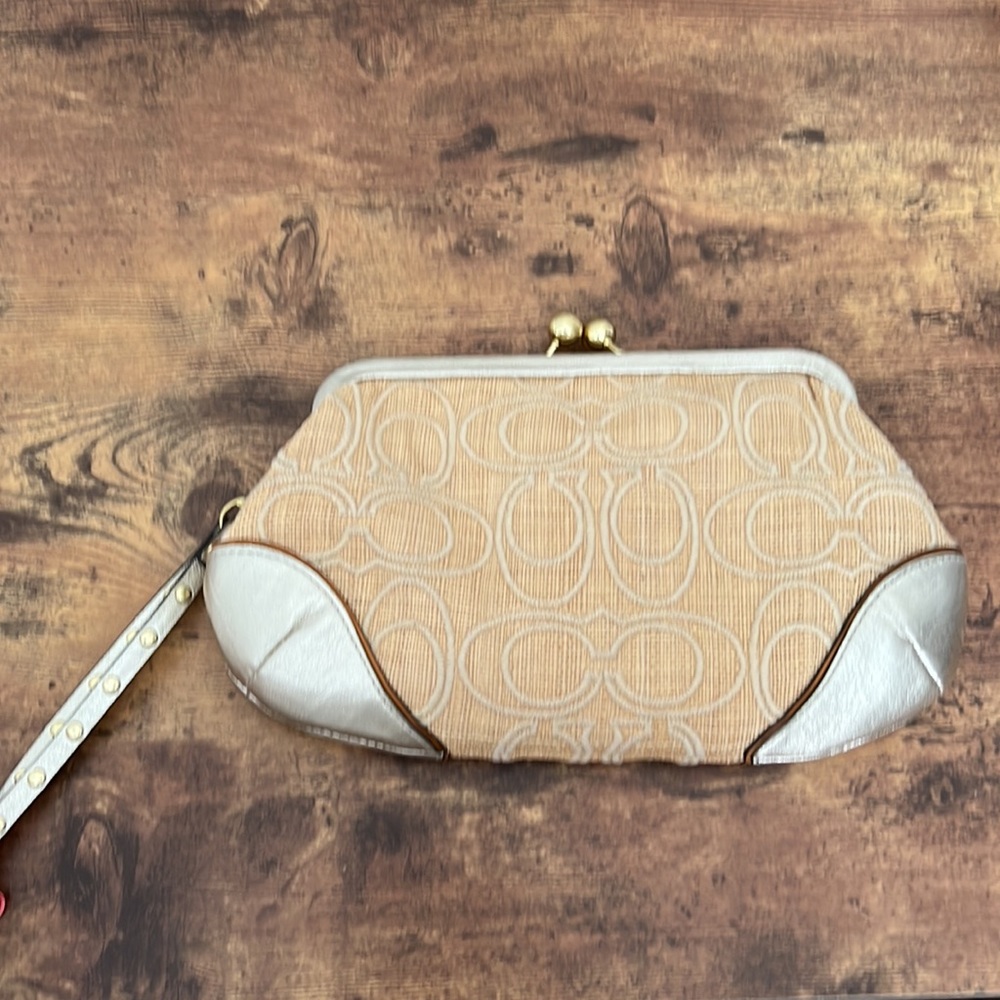 COACH like new straw and gold wristlet class C monogram with clutch closure